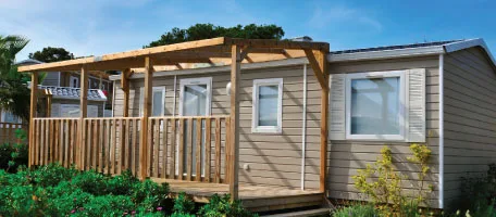 A manufactured home with a covered porch sits in the sun — the kind of mobile and modular home Reliable Comfort Services keeps comfortable across Murfreesboro.